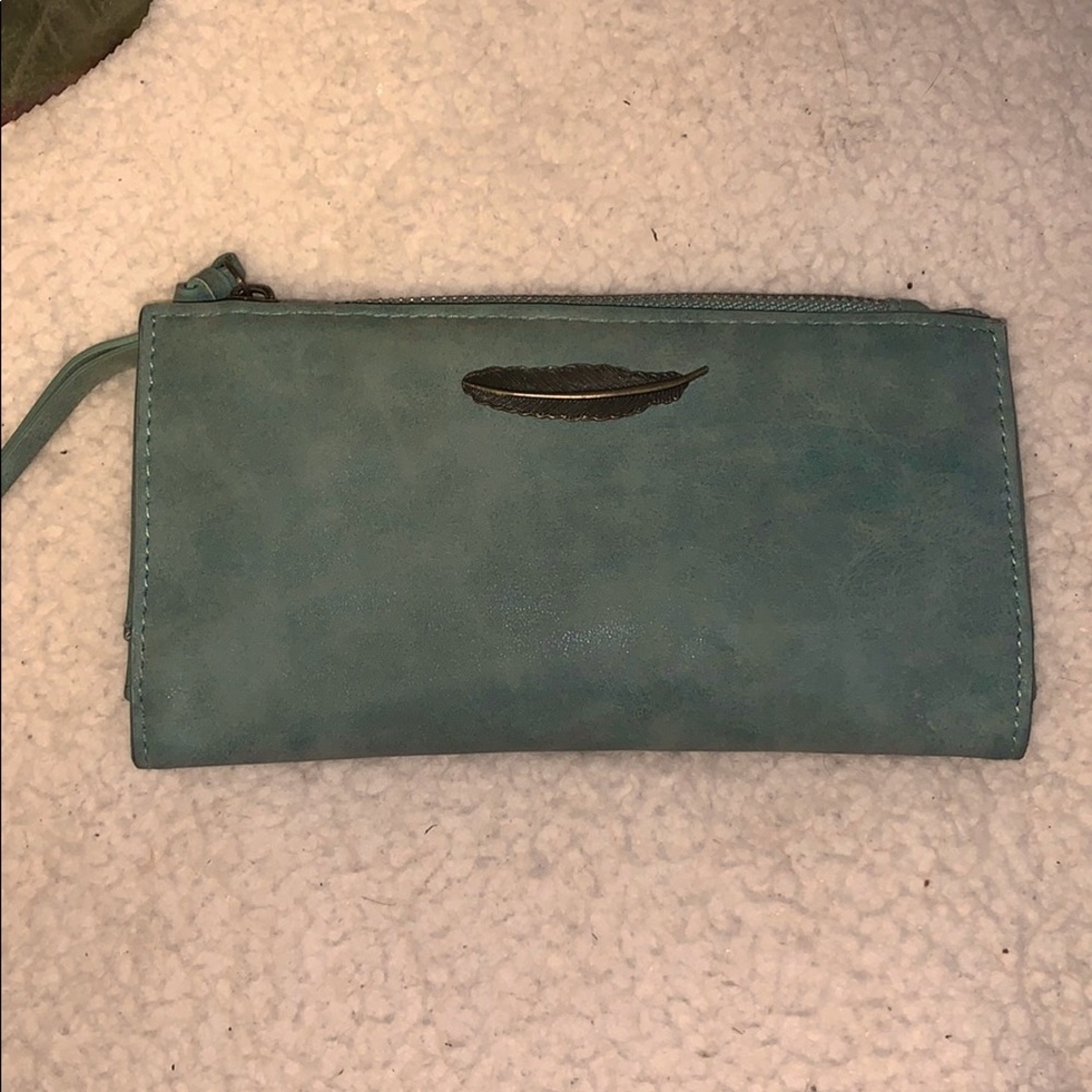 Sapphire blue wallet with feather detail